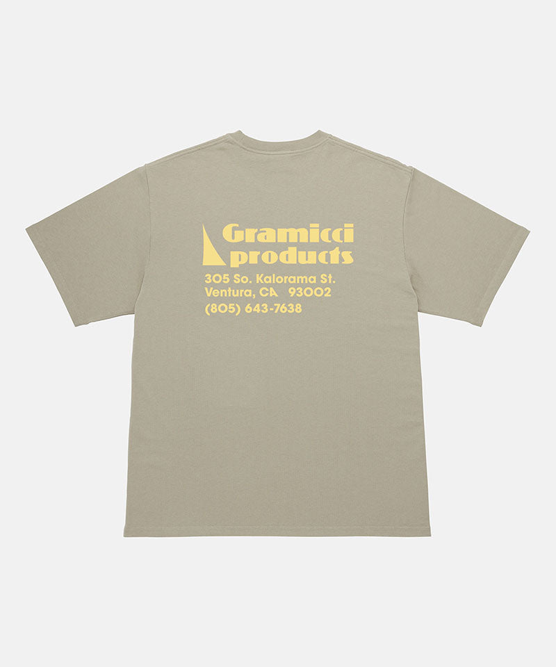 Back view of a Gramicci beige G-Sail Tee with a yellow graphic against a light-tone background.