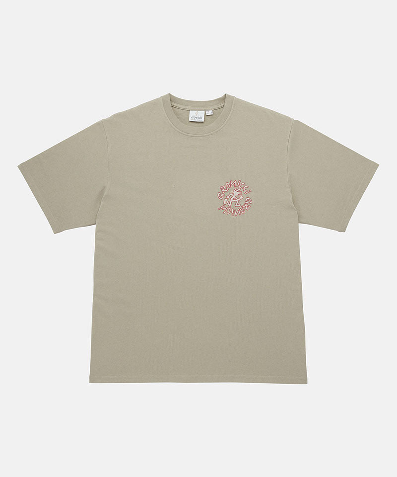 Gramicci beige Running Man Tee with graphic against a light tone background.
