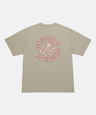 Gramicci beige Running Man Tee with graphic against a light tone background.
