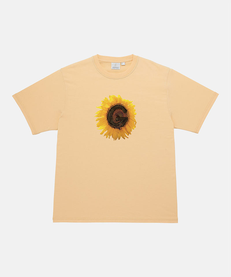 Gramicci mango G-Flower Tee with sunflower graphic against a light tone background.