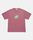 Gramicci red G-Scribble Tee Pigment Dyed shirt with a green graphic against a light tone background.

