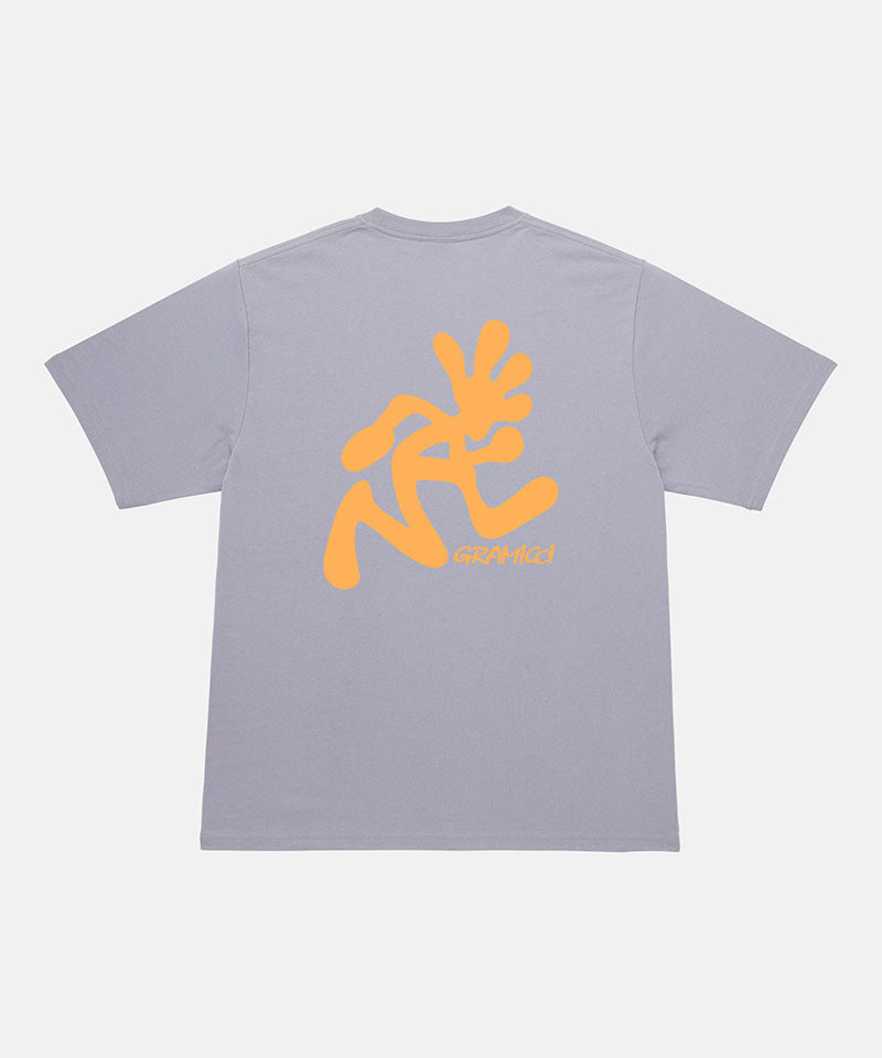 Back view of a Gramicci lavender Running Man Tee with dark mango colored graphic against a light-tone background.