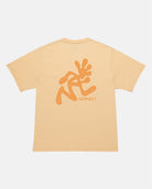 Back view of a Gramicci mango colored Running Man Tee with dark mango colored graphic against a light-tone background.