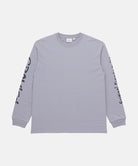 Gramicci lavender Freedom L/S Tee with black graphic on sleeves against a light tone background.
