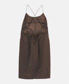 Back view of a Gramicci Women's Woven Milton Dress in the color walnut on a light-tone background.
