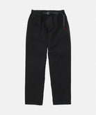 Black Gramicci Women's Brooks Pants with a belt against a light-tone background.