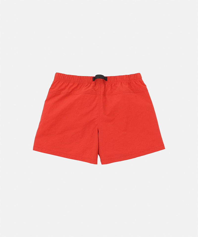 Back view of the Gramicci Women's Nylon Active Short in burnt orange against a light-tone background.