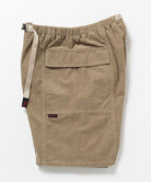 Beige Gramicci Women's Corduroy Utility Short with a beige belt against a light-tone background.