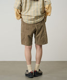 Back view of the Gramicci Women's Corduroy Utility Short in beige against a light-tone background.
