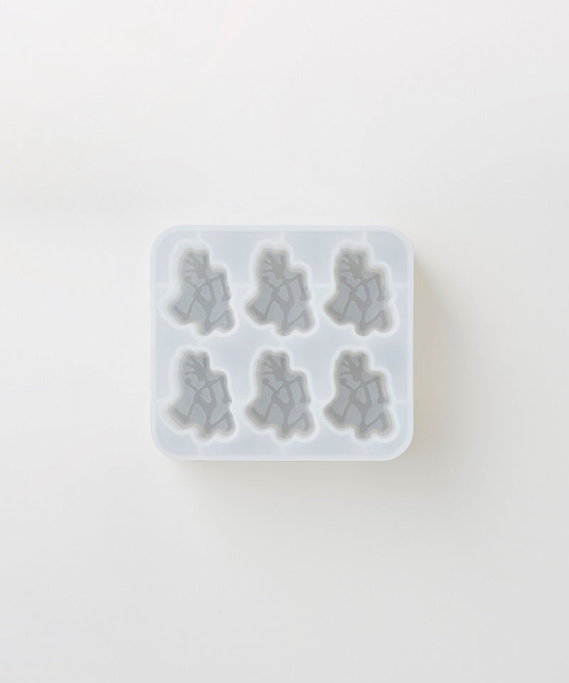 Gramicci Running Man Ice Cube Tray on a light-tone background.