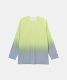 A long-sleeve crewneck shirt with a smooth vertical gradient transitioning from a bright chartreuse yellow-green at the top to a light blue-gray at the bottom. The right sleeve features a vertical white graphic print reading 'Gramicci'.
